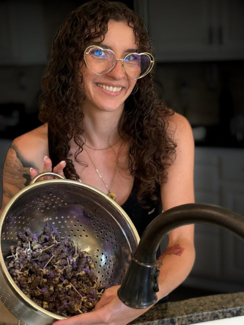 Rinsed English lavender draining in a colander before the cook-down